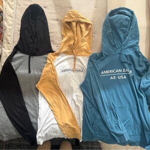 American Eagle T-shirt Hoodies in Black, Mustard, and Blue